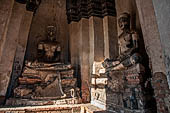 Ayutthaya, Thailand. Wat Chaiwatthanaram, the remains of Buddha statues inside the corner chedi of the gallery.